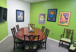Positive energy is created in this bright and fun meeting room. It is located discretely next to the lobby, and works great for 3-6 people.